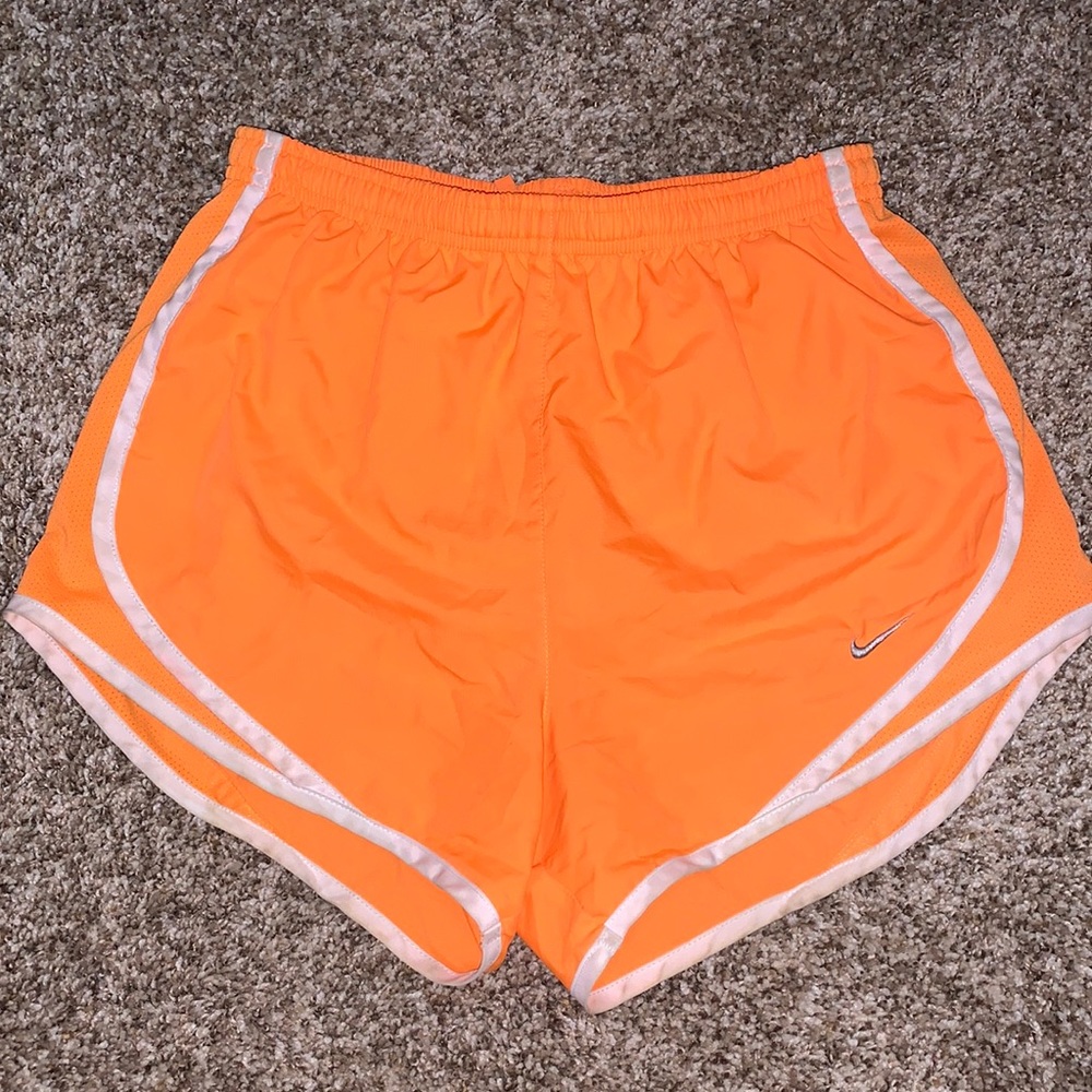 Orange Nike shorts